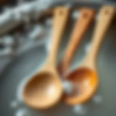 Wooden spoons soaking in soapy water